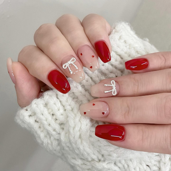 100 Best Valentine’s Day Nails ideas : Mix of Bold and Subtle Valentine’s Nail Art with 3D Bow & Hearts