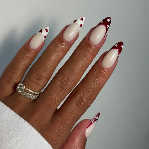 Romantic Almond-Shaped French Tip Nails with Red and White Heart Accents, Red and Pink Valentine’s Day Nail Art with Cute Heart Accents, Pink Valentine’s Day Nails, simple valentine's day nails, Best Valentine's Day Nails ideas, Valentine's Nails, Valentine nails, Valentine's day nails, cute Valentine's nail art