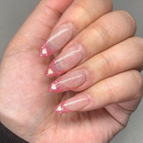 Soft & Romantic Shimmery Rose Pink French Tips with Heart Accents, Valentine’s Day Nails, simple valentine's day nails, Best Valentine's Day Nails ideas, Valentine's Nails, Valentine nails, Valentine's day nails, cute Valentine's nail art