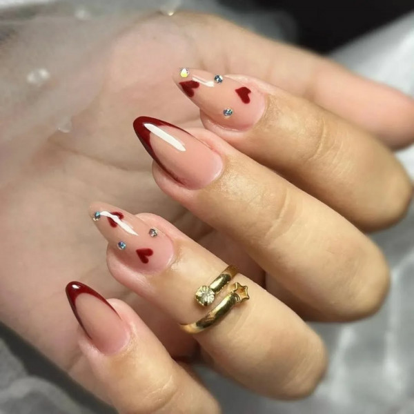 Elegant Red French Tip Nails with Heart Accents, Best Valentine's Day Nails ideas, Valentine's Nails, Valentine nails, Valentine's day nails, cute Valentine's nail art