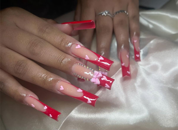 100 Best Valentine’s Day Nails ideas : Red Tip Long Acrylic Nails with Pink Hearts