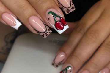 Nude square nails with cherry art and leopard print French tips