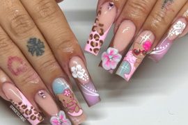 Long pink coffin nails with 3D art, cartoon kitty design, and glossy finish