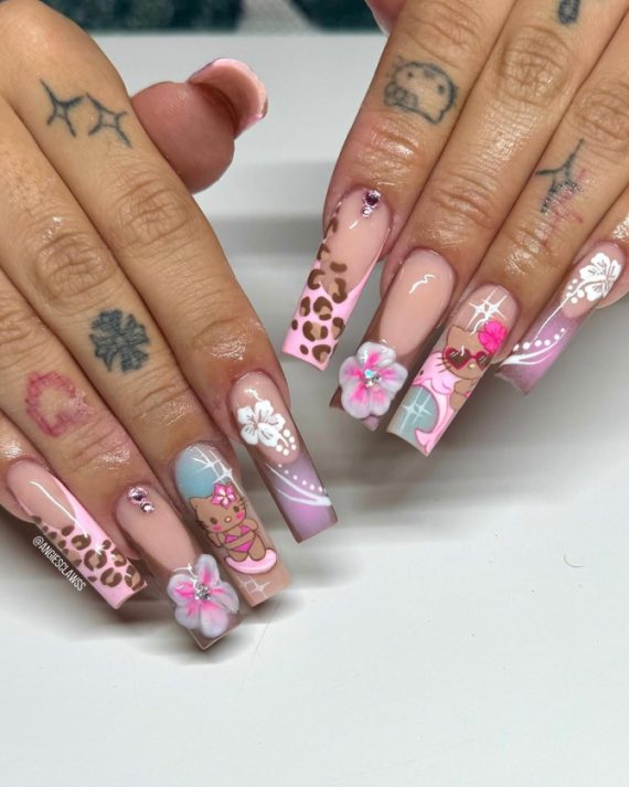 Long pink coffin nails with 3D art, cartoon kitty design, and glossy finish
