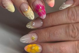Beachy Almond Nails with 3D Flowers, Pearls, and Seaside Accents