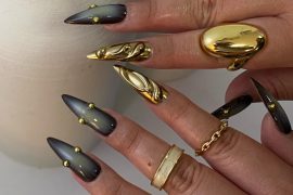 Black and Gold Sculpted Stiletto Nails for a Luxe Statement Look