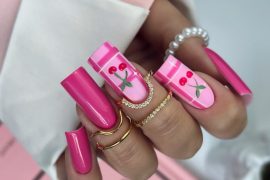 Long square nails in hot pink with cherry art and striped accents on pink base
