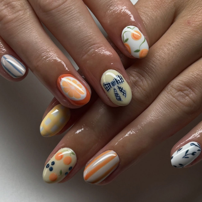 Short oval nails with citrus slices, gingham bows, floral prints, and colorful mix-and-match fruit patterns