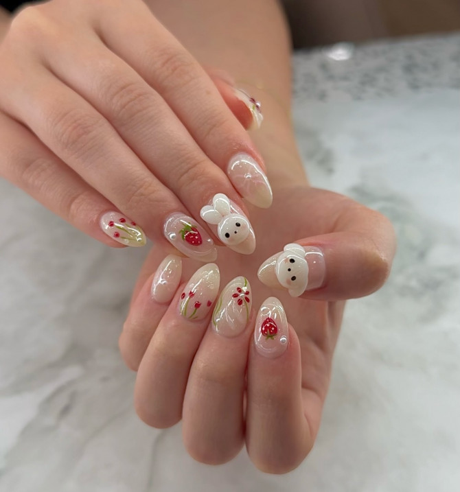 Almond-shaped jelly nude nails with 3D bunny and strawberry design