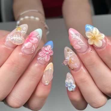 Tropical Vibe Nails with 3D Blooms and Ocean-Inspired Accents