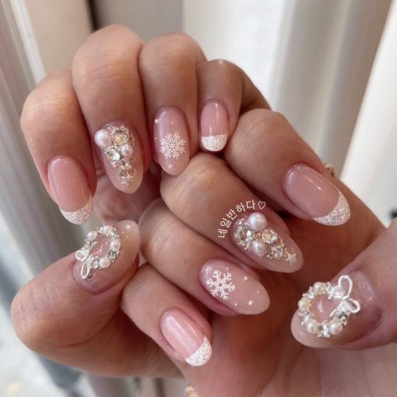 3D Nail Art Tutorial: winter pink gel nails with glittery French tips, snowflakes, and pearl wreaths with crystals