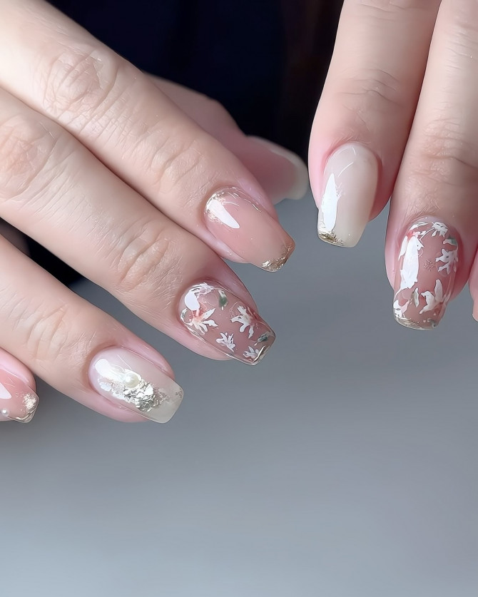 Bridal nude nails with botanical florals, pearls, and gold leaf – natural garden wedding design