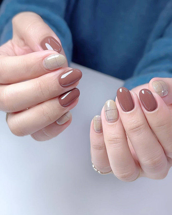 mocha and nude plaid nail art with glossy finish on oval nailselegant and playful nail designs with nude tones and gold foil