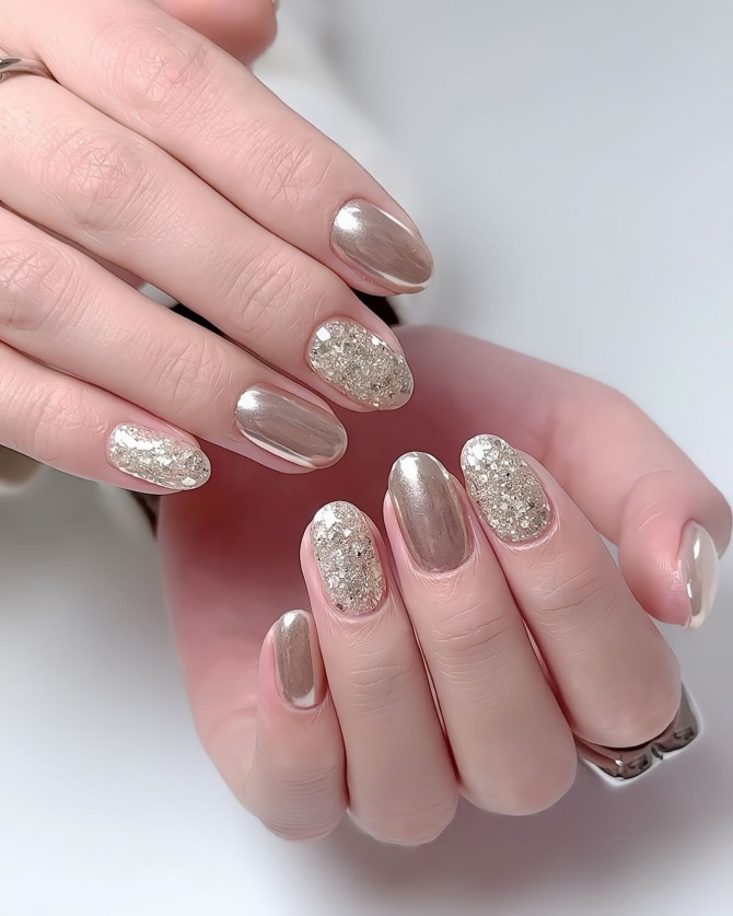 gold chrome nails with chunky glitter accents in oval shapeelegant and playful nail designs with nude tones and gold foil