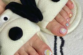 Toe nails with lemon slice and iced drink designs, polished in pastel shimmer tones with short square shape