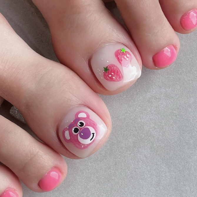 Toe nails with pink polish, Lotso bear art on big toe, and glossy strawberry design on short square nails
