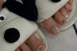 Toe nails with teddy bear art, handwritten-style text, polka dots and neutral pastel polish in short square shape
