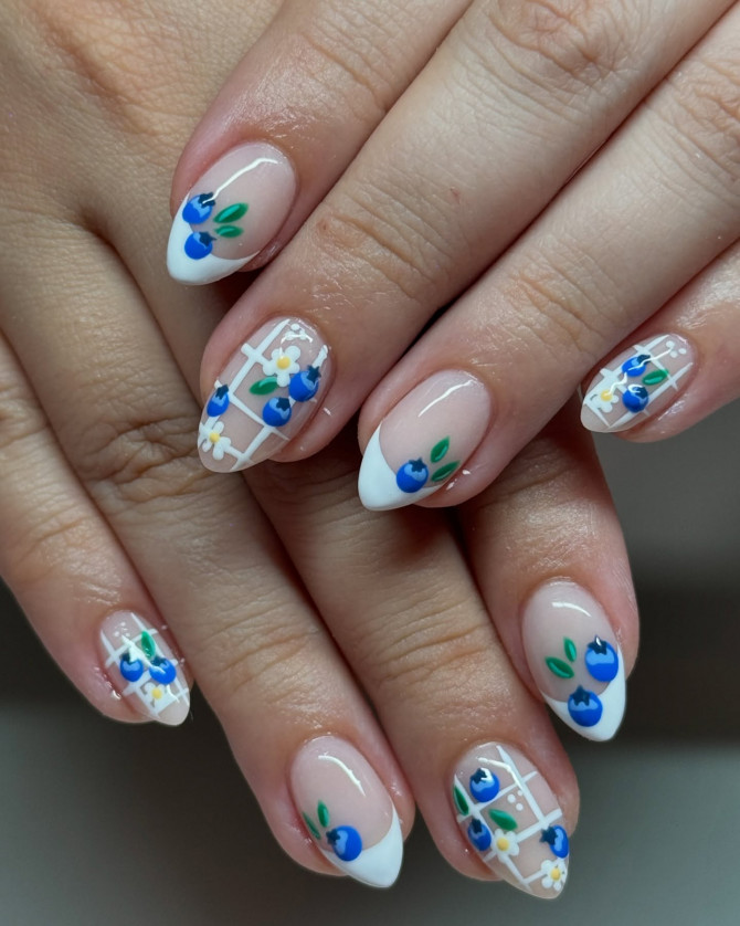 blueberry nail designs with French tips, white lattice, and floral berry art for summer