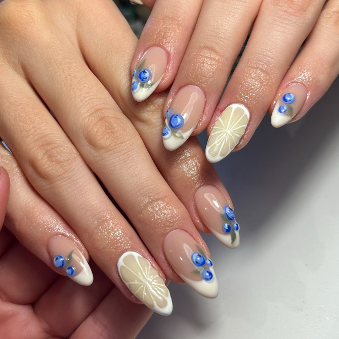  blueberry nail designs with white tips and 3D lemon slices on nude almond base