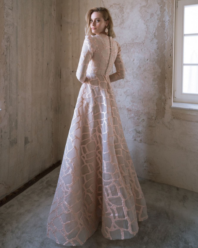 Bride in ruffle one-shoulder wedding gown with couture folds