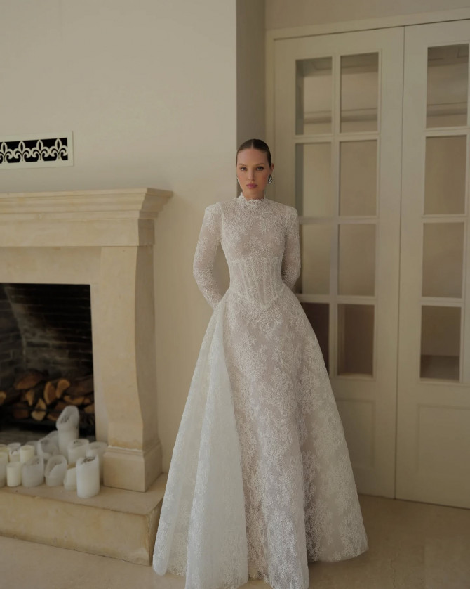 Bride in high-neck embellished princess wedding dress