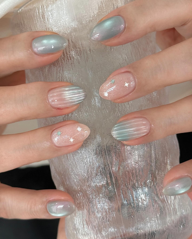 Iridescent jelly nails with pastel glow and star details.