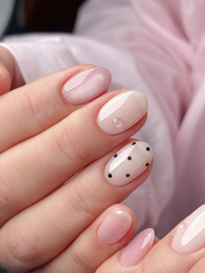 Pink nude polish with tiny black polka dots