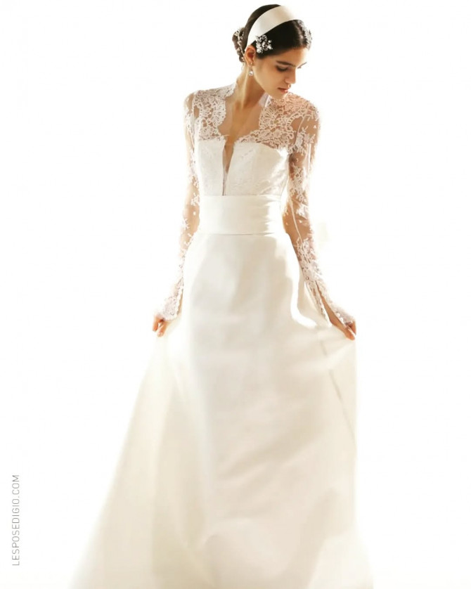 Bride in off-shoulder lace gown with 3D floral embroidery. lace wedding dress 