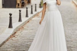 Sleek bridal gown with romantic lace detail by sofia_weddingworld