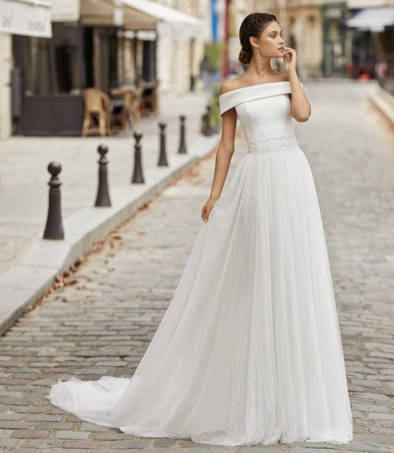 Sleek bridal gown with romantic lace detail by sofia_weddingworld