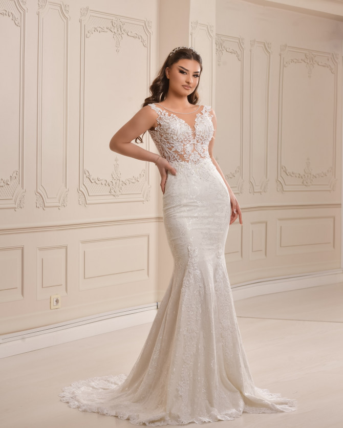 Bride in silver-thread embellished gown with princess silhouette