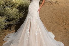 Bride in floral lace dress with sweetheart neckline.