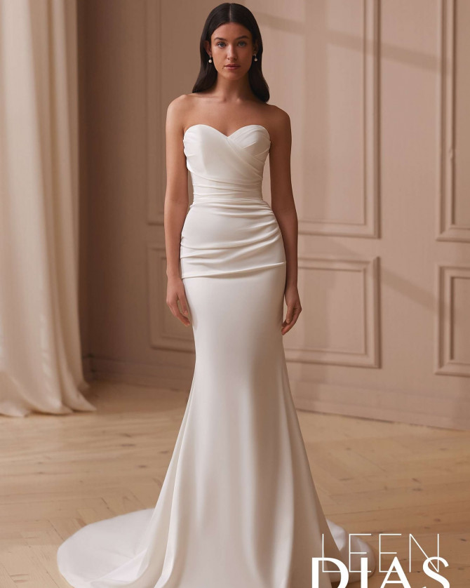 Bride in structured satin dress with folded bodice