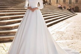 Bride in glittery off-shoulder princess-inspired ball gown