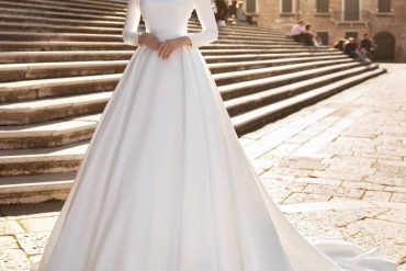 Bride in glittery off-shoulder princess-inspired ball gown