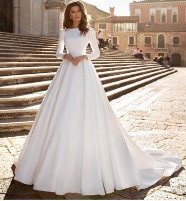 Bride in glittery off-shoulder princess-inspired ball gown