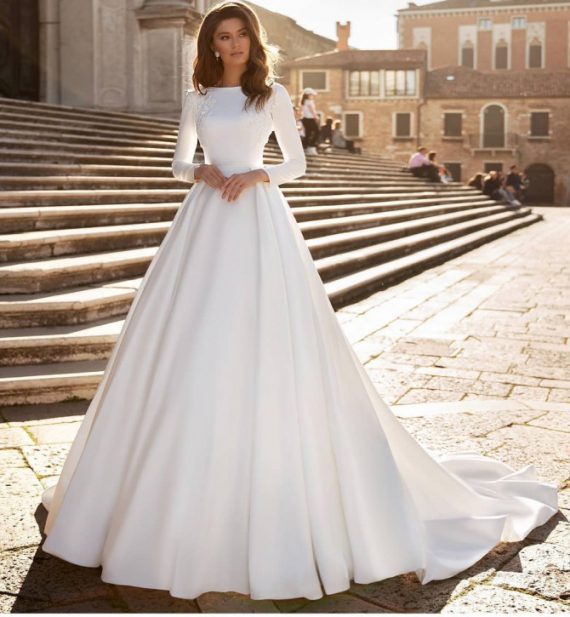 Bride in glittery off-shoulder princess-inspired ball gown