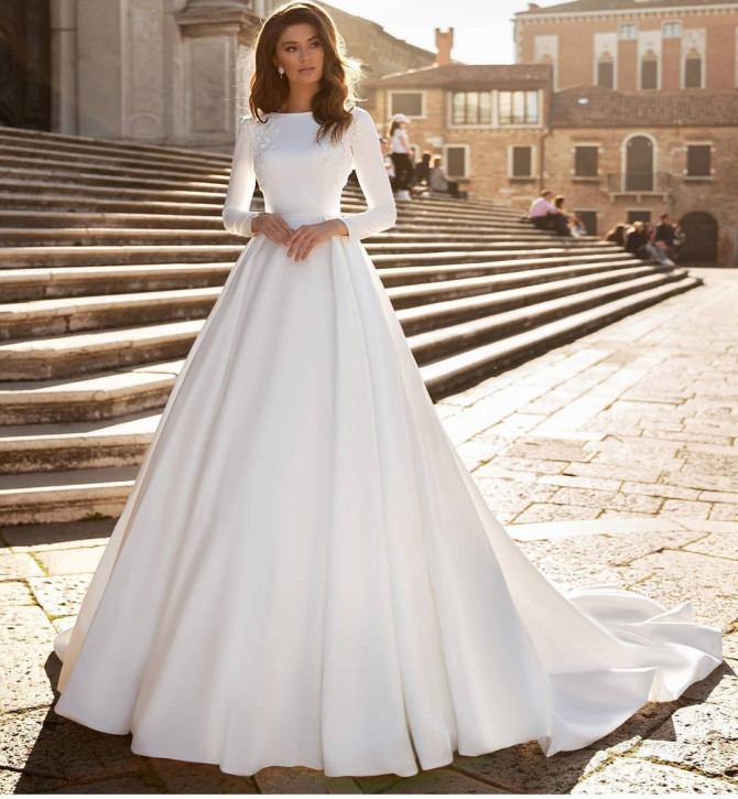 Bride in glittery off-shoulder princess-inspired ball gown