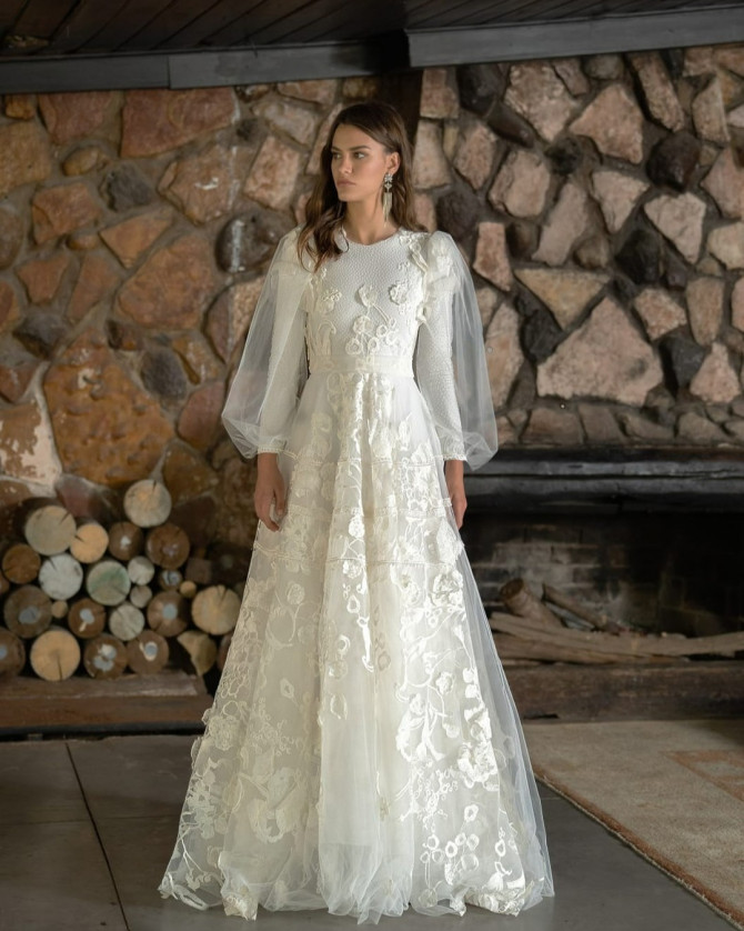 Bride in sheer unique necklines bridal gown with illusion panel