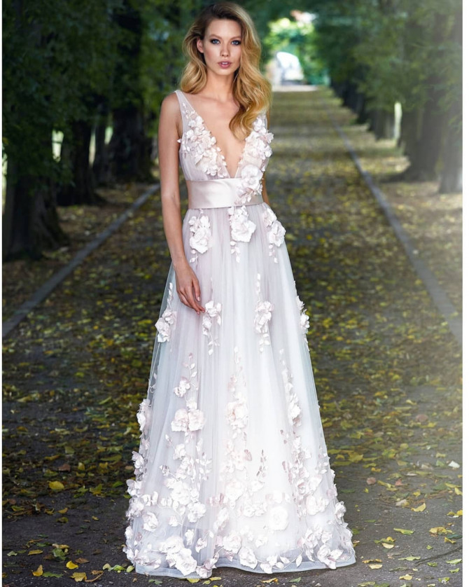 Bride in strapless slit satin modern wedding gown