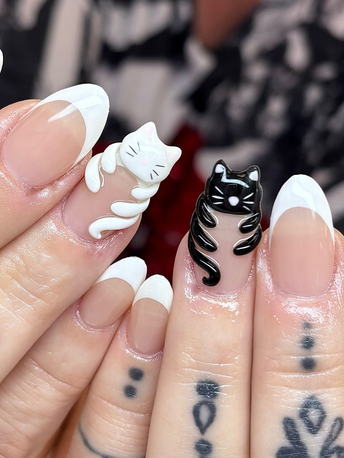 French tip nails with 3D sculpted white and black cats Minimalist Blue Nails with Pearl Bow Tips