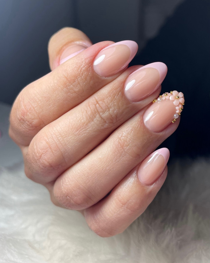 soft French bridal nails with pearls and floral cluster