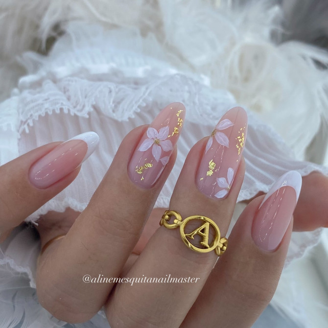 romantic nude bridal nails with floral and gold foil details