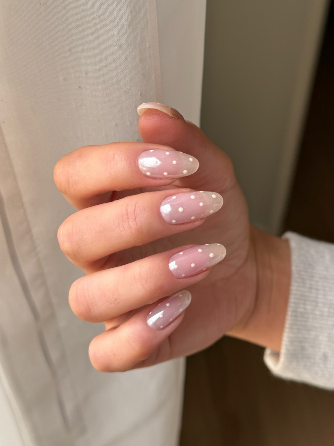 soft pink nails with delicate white dots