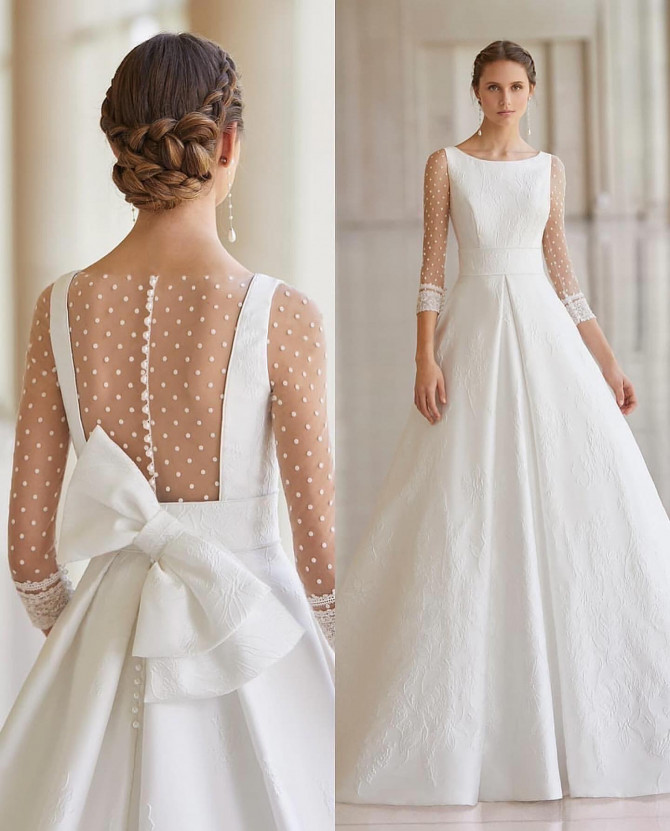 Swiss-dot illusion back and sleeves on textured white ballgown — international bridal gowns modern princess.