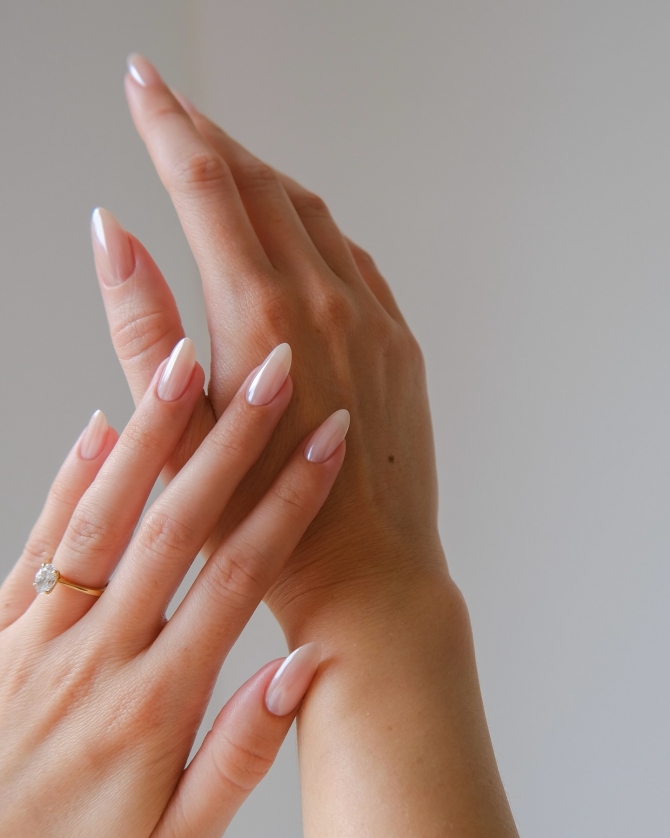 Blush gloss manicure with a subtle pearl sheen