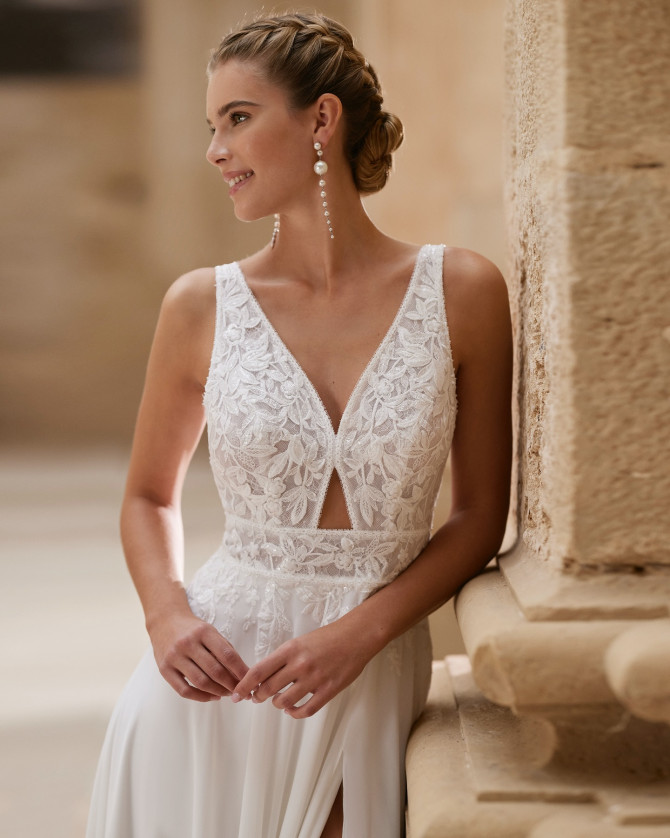 Lace V-neck bodice with keyhole waist and chiffon skirt — international bridal gowns elegance.