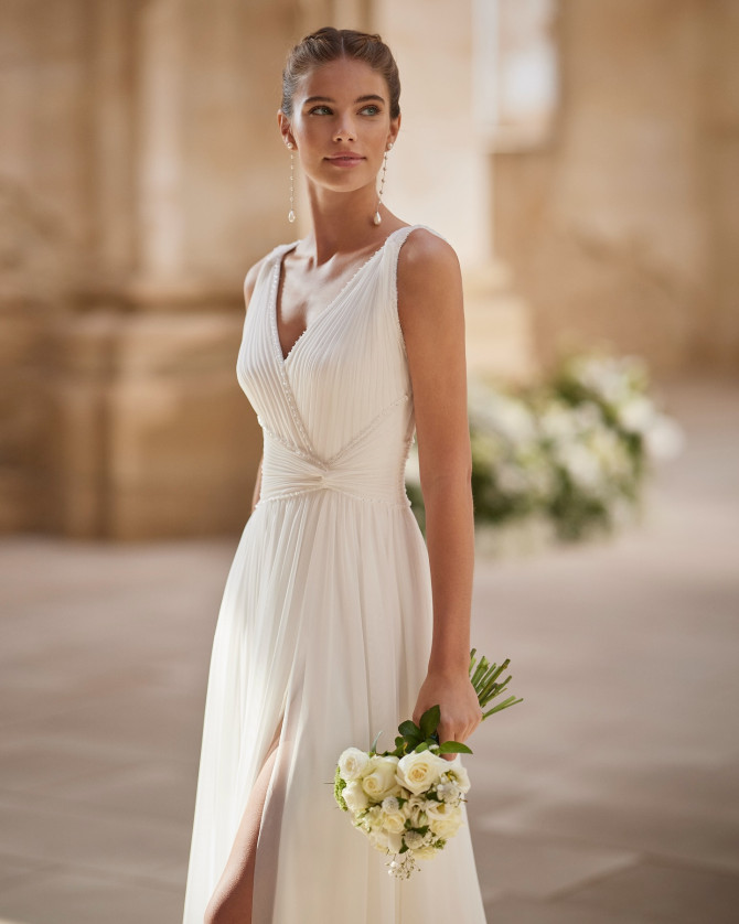 Pleated V-neck chiffon A-line with side slit — international bridal gowns inspiration