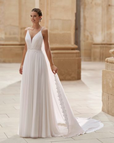 Spaghetti-strap chiffon wedding dress with lace-edged train — international bridal gowns.