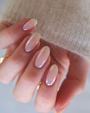 "Soft pink almond nails with pearly glazed finish, minimalist and elegant for bridal and everyday looks"